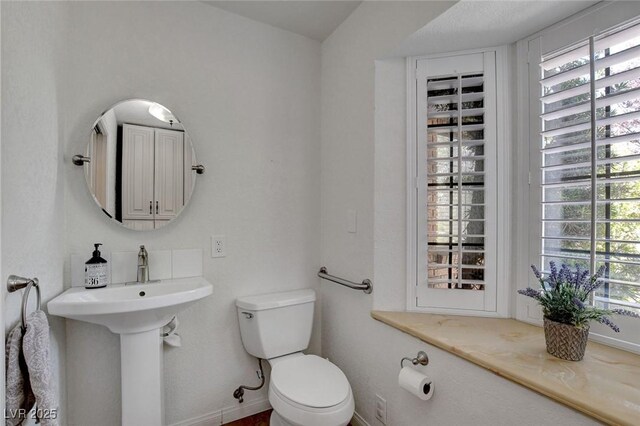 1700 Red Rock St, Las Vegas, NV 89146 - half bath with toilet and baseboards