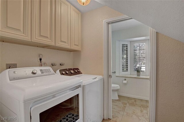 1700 Red Rock St, Las Vegas, NV 89146 - laundry room featuring separate washer and dryer, baseboards, and a textured wall