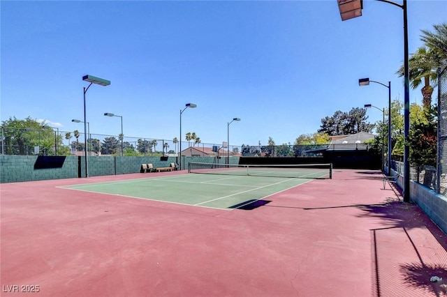 1700 Red Rock St, Las Vegas, NV 89146 - view of tennis court with fence and community basketball court