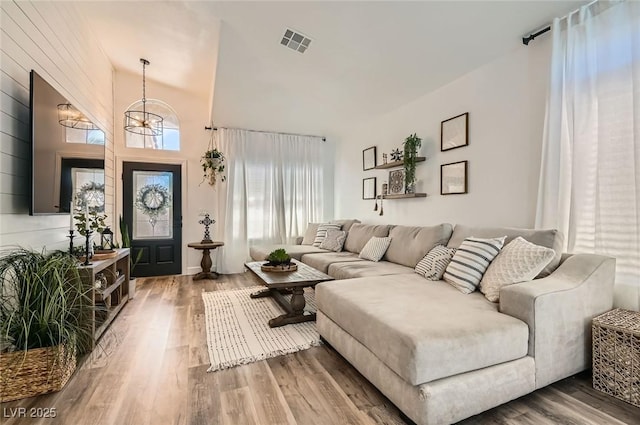 2470 Lower Meadows Ave, Henderson, NV 89052 - living area with wood finished floors and a chandelier