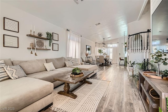 2470 Lower Meadows Ave, Henderson, NV 89052 - living area with wood finished floors and lofted ceiling