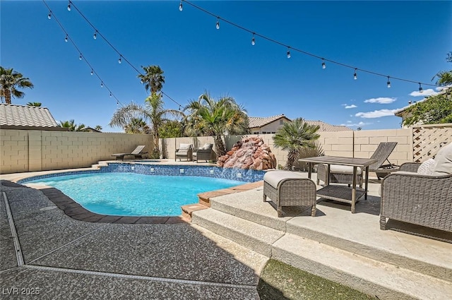 2470 Lower Meadows Ave, Henderson, NV 89052 - view of swimming pool with outdoor lounge area, a fenced backyard, and a patio area