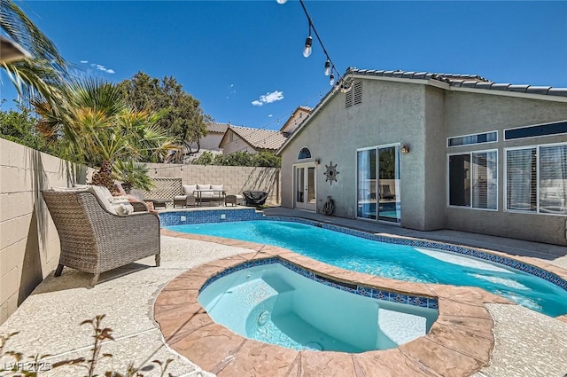 2470 Lower Meadows Ave, Henderson, NV 89052 - view of pool with an in-ground hot tub, a fenced backyard, a patio area, an outdoor living space, and french doors