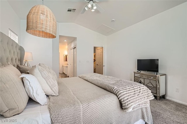 2470 Lower Meadows Ave, Henderson, NV 89052 - bedroom featuring lofted ceiling, attic access, carpet floors, ensuite bath, and a closet
