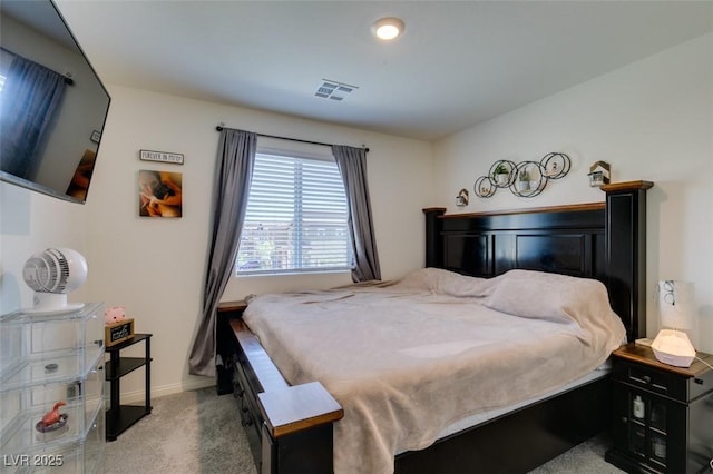 bedroom featuring carpet flooring and baseboards