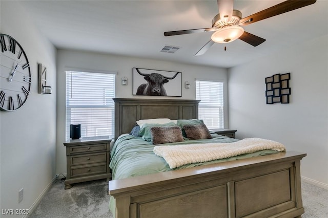 bedroom featuring carpet floors, baseboards, and a ceiling fan