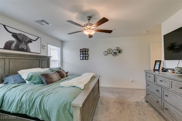 bedroom featuring light carpet, baseboards, and ceiling fan