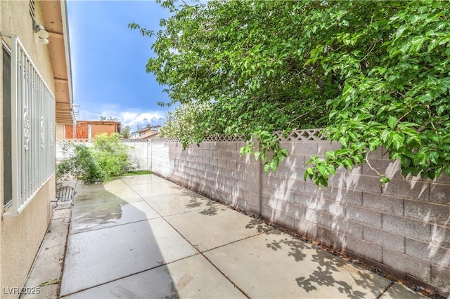 view of patio featuring a fenced backyard