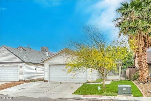 view of front facade with driveway and an attached garage