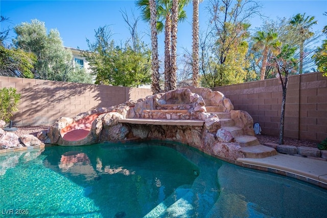 view of pool featuring a fenced backyard