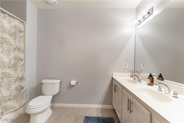 20 E Serene Ave Unit 111, Las Vegas, NV 89123 - full bath featuring tile patterned floors, toilet, double vanity, baseboards, and curtained shower