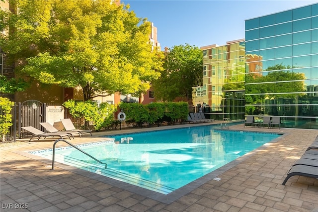 20 E Serene Ave Unit 111, Las Vegas, NV 89123 - community pool with a patio area and fence