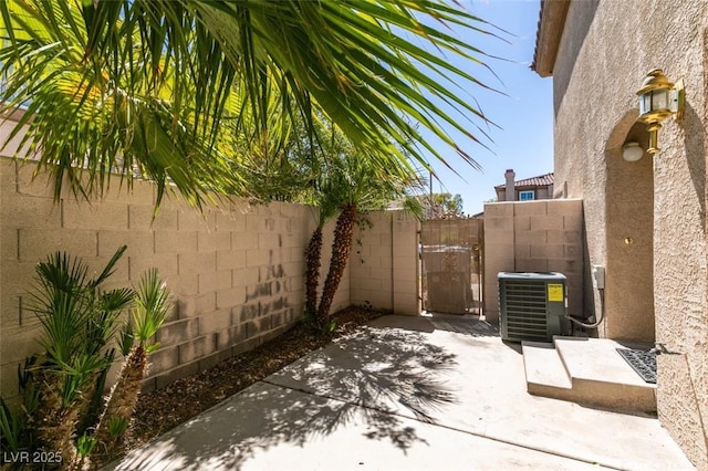 7732 Almeria Ave, Las Vegas, NV 89128 - view of patio featuring central AC and fence