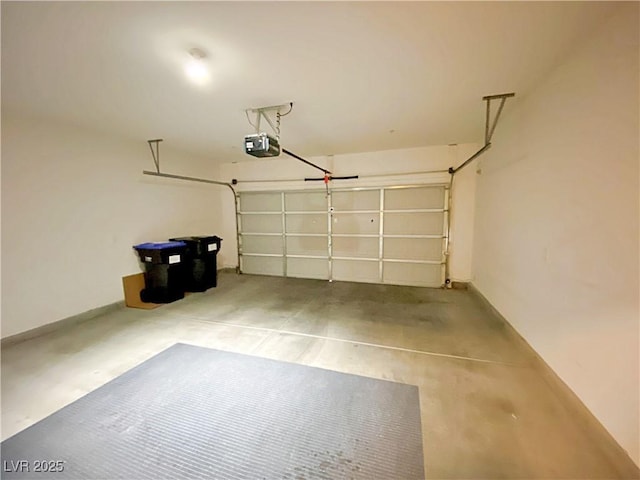 garage featuring a garage door opener