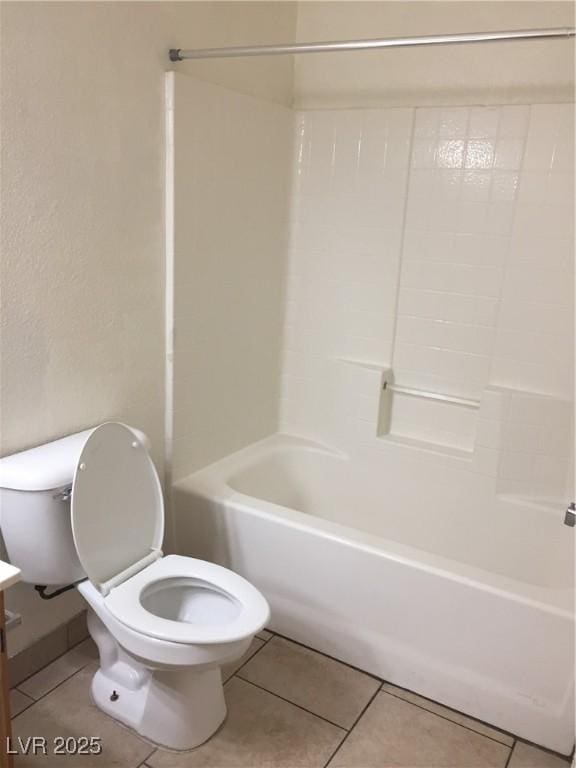 bathroom featuring toilet, tile patterned flooring, and vanity