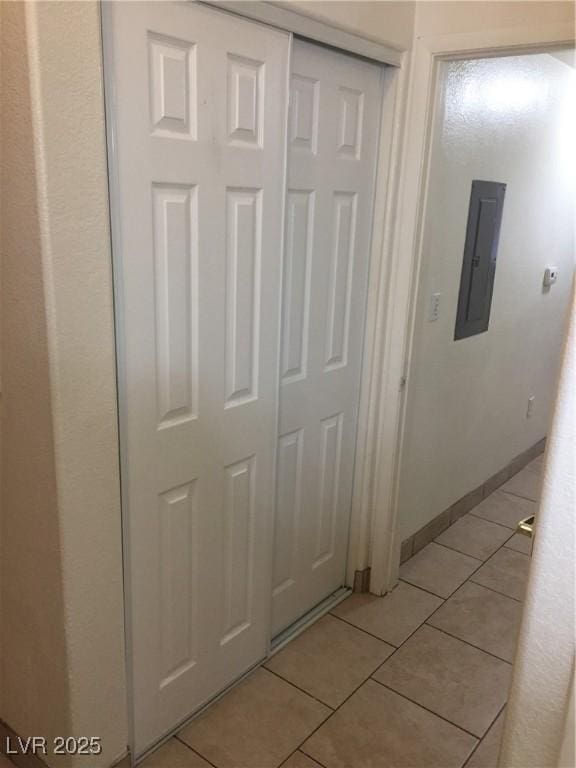 detailed view of electric panel and baseboards