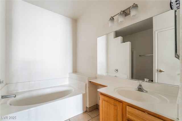 5655 E Sahara Ave Unit 1037, Las Vegas, NV 89142 - bathroom featuring a garden tub, tile patterned floors, and vanity