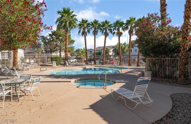5655 E Sahara Ave Unit 1037, Las Vegas, NV 89142 - community pool with a community hot tub and a patio