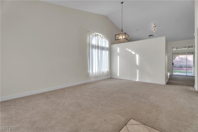 unfurnished dining area with a chandelier, light carpet, baseboards, and high vaulted ceiling