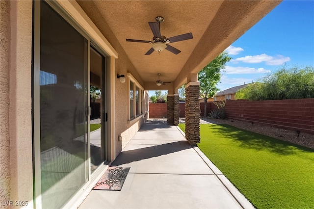 view of patio / terrace featuring a ceiling fan