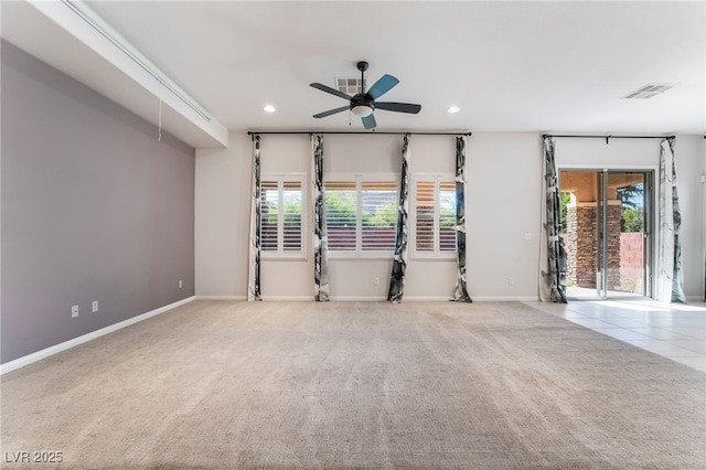 carpeted empty room featuring ceiling fan, recessed lighting, and baseboards