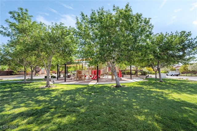 view of property's community with a lawn