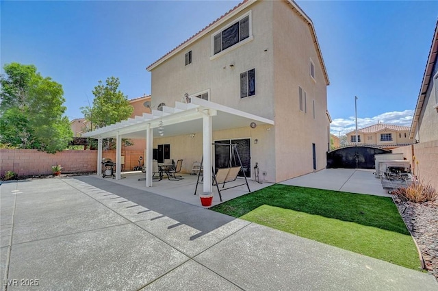 9656 Paraiso Springs St, Las Vegas, NV 89139 - back of house featuring stucco siding, a pergola, and a patio