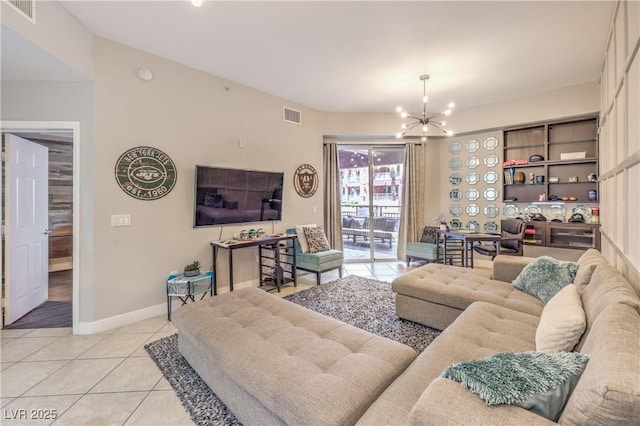 91 E Agate Ave Unit 204, Las Vegas, NV 89123 - living area with light tile patterned floors, a chandelier, and baseboards
