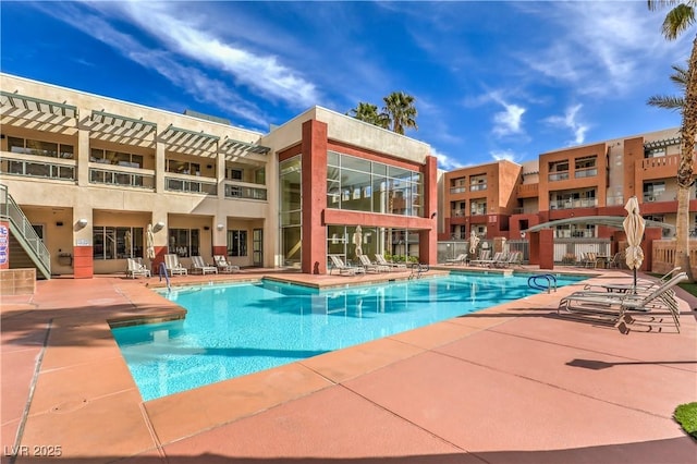 91 E Agate Ave Unit 204, Las Vegas, NV 89123 - community pool featuring a patio