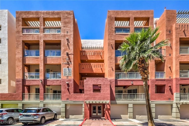 91 E Agate Ave Unit 204, Las Vegas, NV 89123 - view of apartment building / complex with an attached garage