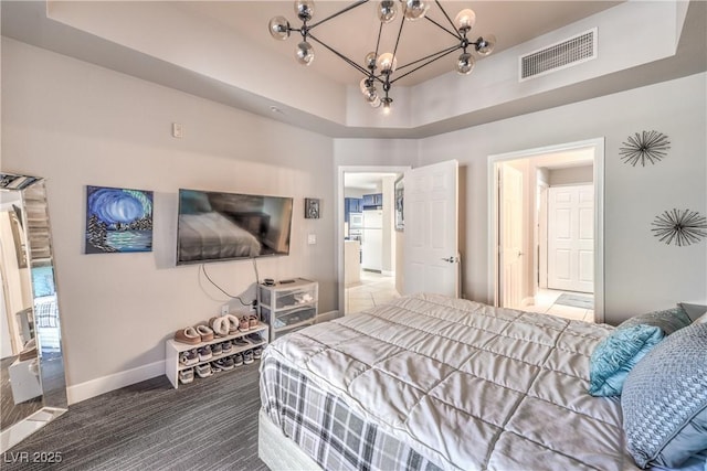 91 E Agate Ave Unit 204, Las Vegas, NV 89123 - carpeted bedroom featuring a chandelier and baseboards
