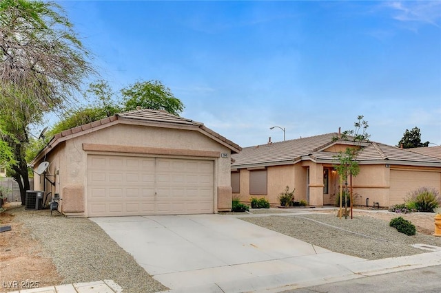 7949 Long Beach St, Las Vegas, NV 89139 - single story home with driveway, stucco siding, an attached garage, and a tiled roof