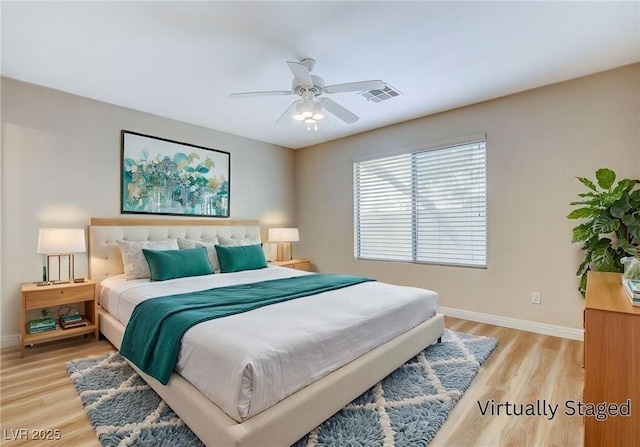 7949 Long Beach St, Las Vegas, NV 89139 - bedroom with baseboards, light wood-type flooring, and ceiling fan
