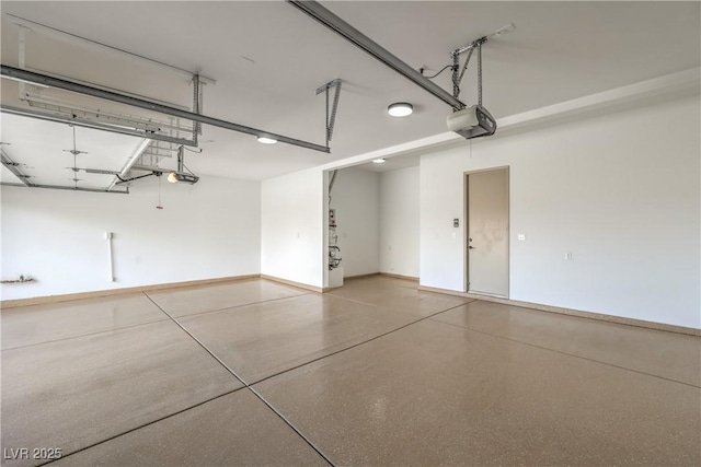 1964 Oliver Springs St, Henderson, NV 89052 - garage featuring a garage door opener and baseboards