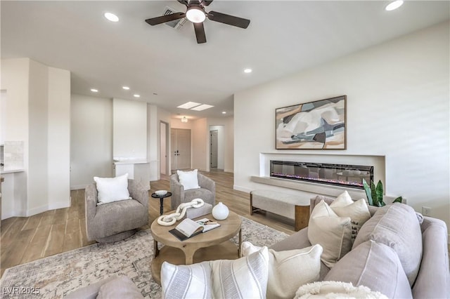 1964 Oliver Springs St, Henderson, NV 89052 - living area with recessed lighting, ceiling fan, wood finished floors, and baseboards