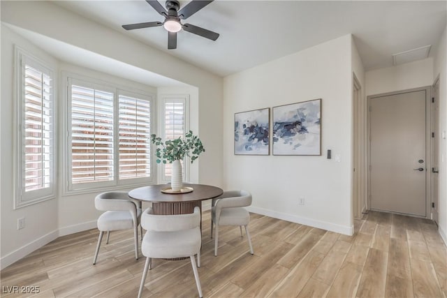1964 Oliver Springs St, Henderson, NV 89052 - dining area featuring light wood finished floors, a ceiling fan, and healthy amount of natural light
