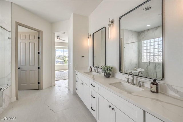 1964 Oliver Springs St, Henderson, NV 89052 - full bathroom featuring a marble finish shower, double vanity, and marble finish flooring