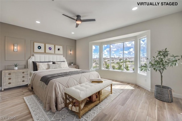 1964 Oliver Springs St, Henderson, NV 89052 - bedroom with light wood-type flooring, recessed lighting, ceiling fan, and baseboards
