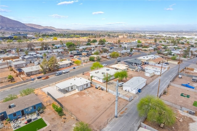 aerial view of residential area with mountains