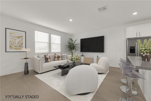 334 Laurel Peak Dr, Henderson, NV 89015 - living room with recessed lighting, light wood-type flooring, and baseboards