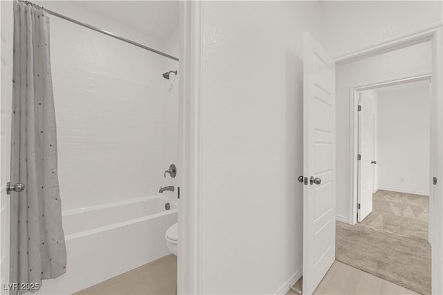334 Laurel Peak Dr, Henderson, NV 89015 - bathroom featuring toilet, shower / bath combination with curtain, and tile patterned floors