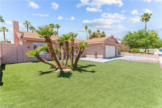 ranch-style home with stucco siding, an attached garage, and driveway