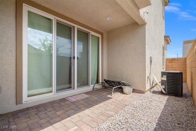 4526 Cloudrest Peak St, North Las Vegas, NV 89031 - view of patio featuring central AC and fence