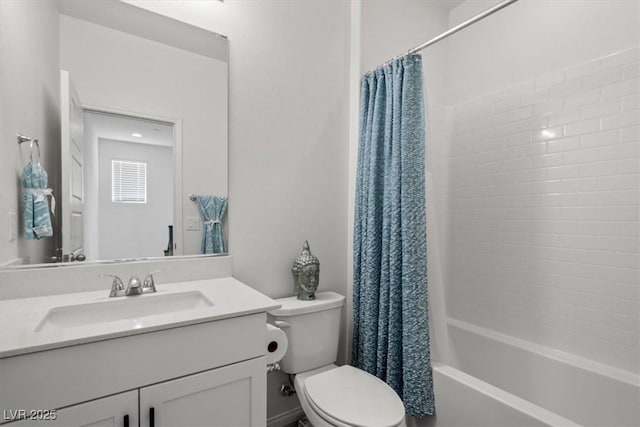 bathroom with toilet, shower / tub combo, and vanity