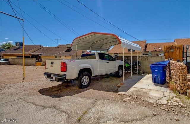 533 Date St, Boulder City, NV 89005 - view of vehicle parking with a detached carport and fence