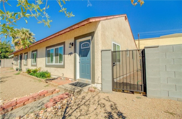 533 Date St, Boulder City, NV 89005 - entrance to property featuring stucco siding, a gate, and fence
