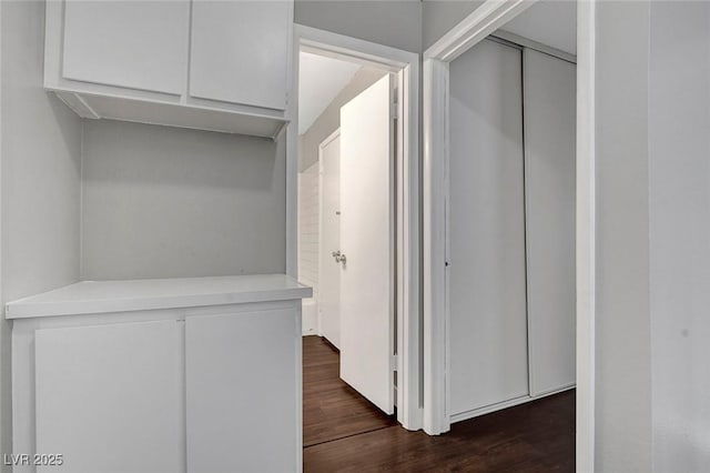4339 Spencer St Unit 15, Las Vegas, NV 89119 - hallway featuring dark wood-style floors