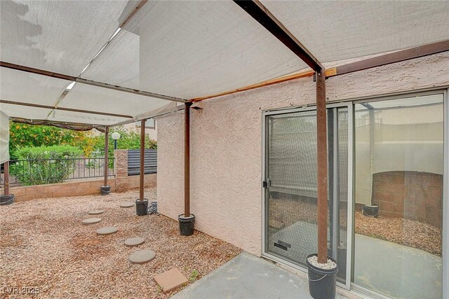 4339 Spencer St Unit 15, Las Vegas, NV 89119 - view of patio with fence