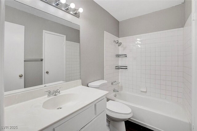 4339 Spencer St Unit 15, Las Vegas, NV 89119 - full bath with toilet, vanity, and bathtub / shower combination