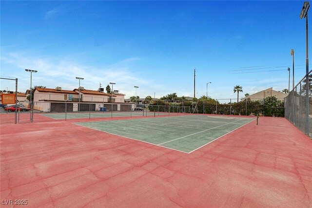 4339 Spencer St Unit 15, Las Vegas, NV 89119 - view of tennis court featuring fence